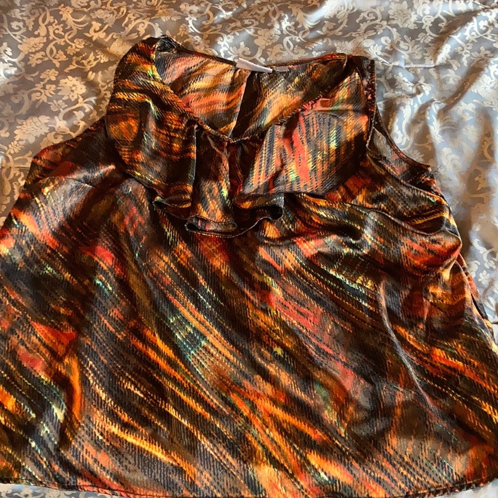 Sleeveless woman’s blouse with ruffle at neckline 18-20